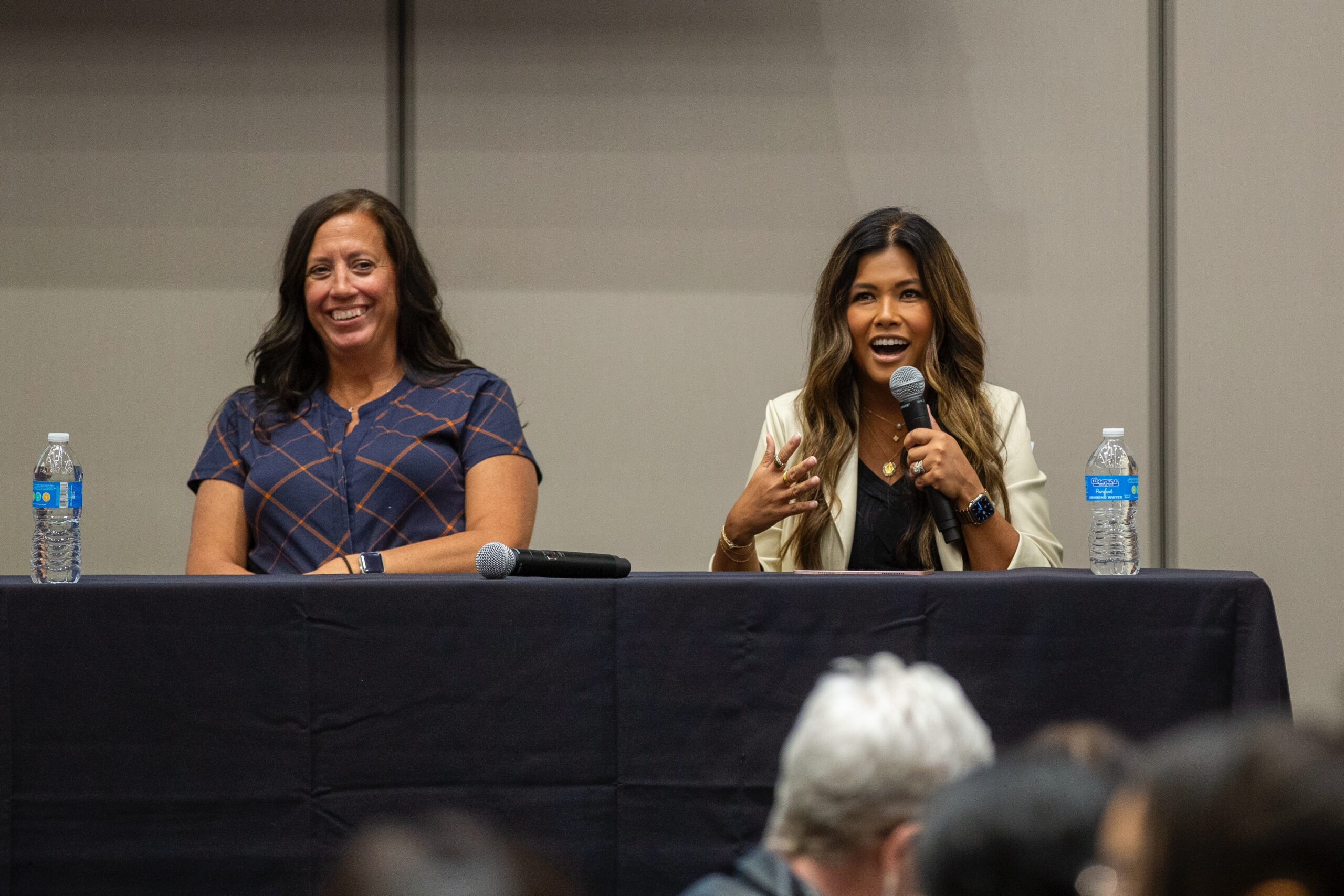 Tiffany Cooley speaking on a women’s leadership panel at the Tempo Waukesha event, discussing how mid-career women are redefining leadership and building new models of work.