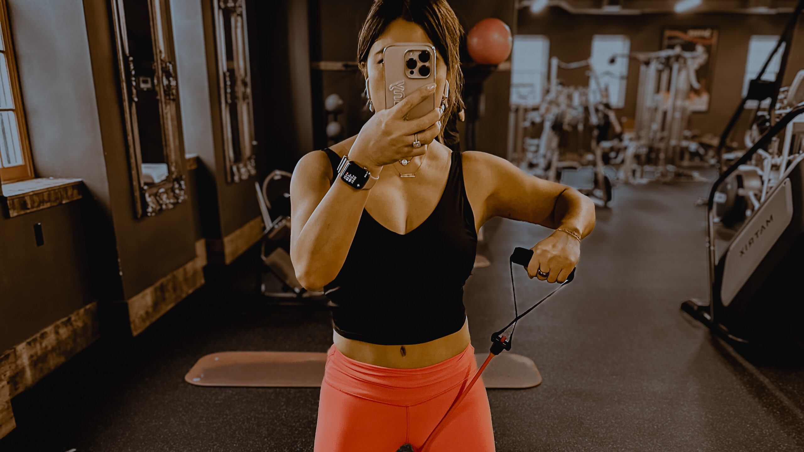 Tiffany Cooley wearing her ?URA Ring while working out; a real example of habit-driven brand loyalty and wellness tech in action.